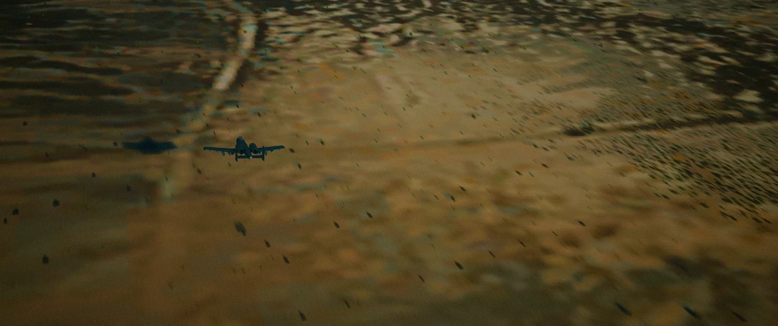 A-10C flying over desert terrain