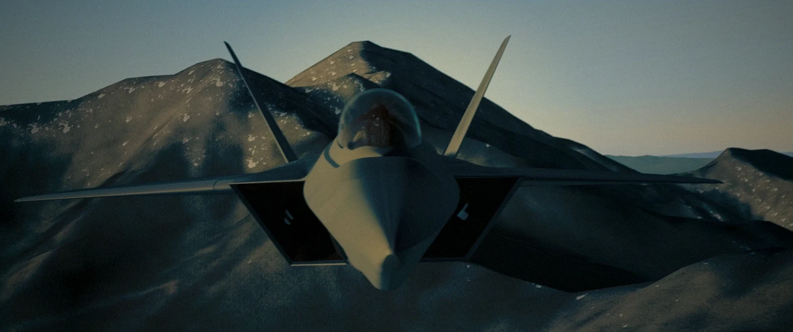 F-22A above a mountain range